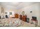 Neutral bedroom with floral bedding and ensuite bathroom at 5550 Monticello Nw Dr, Concord, NC 28027