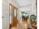 Bright foyer showcases hardwood floors and a view into the adjacent dining room at 5716 Trimmings Ct, Charlotte, NC 28226