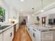 Modern kitchen with white cabinets, granite counters, and a spacious layout perfect for cooking at 5716 Trimmings Ct, Charlotte, NC 28226