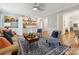 Spacious living room with a comfortable seating area, a butler pantry and a view into the kitchen at 5716 Trimmings Ct, Charlotte, NC 28226