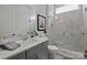 Stylish bathroom featuring marble-look tiles, glass-enclosed shower, and modern fixtures at 7010 Brush Crk, Monroe, NC 28110