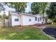 Backyard with red brick patio at 80 Pine St, Badin, NC 28009