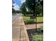 Charming street view with a decorative address sign at 80 Pine St, Badin, NC 28009
