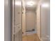 Hallway featuring lots of storage and carpet flooring at 80 Pine St, Badin, NC 28009