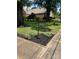 Landscaped yard with an elegant sign post displaying the property's address at 80 Pine St, Badin, NC 28097