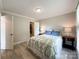 Bedroom featuring neutral paint colors, wood floors and closet at 8105 Rachel Ct, Waxhaw, NC 28173