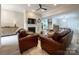 Cozy living room with hardwood floors, fireplace and plenty of natural light at 8105 Rachel Ct, Waxhaw, NC 28173