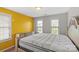 Bedroom featuring neutral walls, carpet flooring, comfortable mattress, and natural light at 8347 Dallas Bay Rd, Charlotte, NC 28278