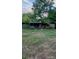 Storage building on edge of the lot at 84 Sumner Nw Ave, Concord, NC 28027