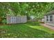 Spacious backyard featuring a storage shed and well-maintained lawn at 901 Scaleybark Rd, Charlotte, NC 28209