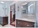 Stylish bathroom with double vanity, granite countertops, and contemporary fixtures at 9625 Surface Hill Rd, Mint Hill, NC 28227