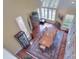 Airy dining room with large windows, hardwood floors, and a spacious dining table at 9625 Surface Hill Rd, Mint Hill, NC 28227