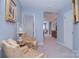 Bright hallway with carpet, chairs and view to other rooms at 9625-A Surface Hill Rd, Mint Hill, NC 28227