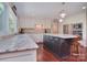 Modern kitchen featuring granite countertops, a kitchen island, and stainless steel appliances at 9625-A Surface Hill Rd, Mint Hill, NC 28227
