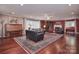 Expansive living room featuring a fireplace, plush seating, and natural light at 9625-A Surface Hill Rd, Mint Hill, NC 28227