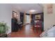Cozy living area with terracotta floors, piano, and comfortable seating at 9625-A Surface Hill Rd, Mint Hill, NC 28227
