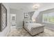 Bright bedroom with plush carpeting, a comfortable bed, and an ensuite bathroom at 9831 Sedgefield Dr, Waxhaw, NC 28173
