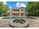 Large pool with a hot tub and a backyard with a nice house and plenty of trees at 9831 Sedgefield Dr, Waxhaw, NC 28173