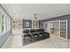 Entertainment space with a built-in bookcase and comfortable theater seating at 9831 Sedgefield Dr, Waxhaw, NC 28173