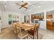 Dining room with ample seating, view to the kitchen and an outdoor view at 1031 Eldorado Ave, Charlotte, NC 28262