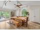 Bright dining room with vaulted ceilings, exposed beams, and large windows for natural light at 1031 Eldorado Ave, Charlotte, NC 28262