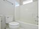 Bathroom featuring a standard toilet and tub-shower, providing essential amenities in a compact space at 105 Woodsong Ln, Mooresville, NC 28117