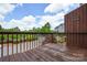 Spacious wooden deck offering neighborhood views, ideal for outdoor relaxation, and a bit of privacy at 105 Woodsong Ln, Mooresville, NC 28117
