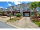 Charming townhomes featuring private decks, attached garages, and well-maintained landscaping in a desirable community at 105 Woodsong Ln, Mooresville, NC 28117