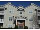 Inviting multi-Gathering condo with neutral siding, and manicured landscaping at 10673 Hill Point Ct, Charlotte, NC 28262