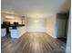 Spacious living area with wood floors and natural light at 10673 Hill Point Ct, Charlotte, NC 28262