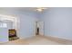 Bedroom featuring light blue walls, vanity, plush carpeting, and access to the closet at 109 Gatwick Ct, Statesville, NC 28677