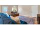 Bright living room featuring hardwood floors, comfortable seating, and an inviting atmosphere for relaxation and entertainment at 109 Gatwick Ct, Statesville, NC 28677