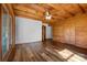 Large bedroom with wood accents, and access to an outdoor patio through glass doors at 11227 Cool Springs Rd, Cleveland, NC 27013