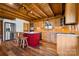 Charming kitchen with wood finishes, stainless steel appliances, and a bright red central island at 11227 Cool Springs Rd, Cleveland, NC 27013