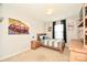 Neutral-toned bedroom features a modern ceiling light and natural light at 120 Tranquil Ct, Locust, NC 28097