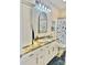 Updated bathroom features granite counters, white cabinets, and stylish nautical-themed decor at 132 Swimmers Ln, Salisbury, NC 28146
