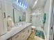 Modern bathroom featuring marble counters, sleek cabinets, and a glass-enclosed shower at 132 Swimmers Ln, Salisbury, NC 28146