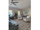 Open living room with ample natural light and luxury vinyl plank flooring throughout at 132 Swimmers Ln, Salisbury, NC 28146