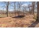 Covered picnic area with tables and a grill is ideal for outdoor entertaining near the water at 132 Swimmers Ln, Salisbury, NC 28146