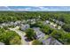 A lush residential neighborhood with well-maintained homes surrounded by mature trees and greenery, offering a serene environment at 1458 Bedlington Nw Dr, Charlotte, NC 28269