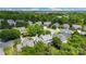 A beautiful neighborhood with diverse homes surrounded by mature trees and lush greenery, creating a peaceful atmosphere at 1458 Bedlington Nw Dr, Charlotte, NC 28269