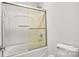 Clean and bright bathroom with a shower and bathtub combination at 1458 Bedlington Nw Dr, Charlotte, NC 28269