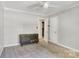 Neutral bedroom with dresser, carpet floor, and bright natural light at 1458 Bedlington Nw Dr, Charlotte, NC 28269