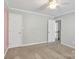 Neutral bedroom featuring carpet floors and bright natural light at 1458 Bedlington Nw Dr, Charlotte, NC 28269