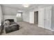 Bonus room features carpet floor, neutral color, and natural light at 1458 Bedlington Nw Dr, Charlotte, NC 28269