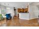 Dining area with a stylish table set and a view into the kitchen at 1458 Bedlington Nw Dr, Charlotte, NC 28269