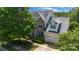 An attractive two-story home with a brick facade, well-maintained landscaping, and a spacious two-car garage at 1458 Bedlington Nw Dr, Charlotte, NC 28269