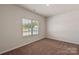 Bedroom with blinds, neutral walls, and carpeted floor at 1510 Doran Ter, Richburg, SC 29729
