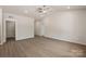 Bright bedroom featuring neutral walls, a ceiling fan, and hardwood floors, providing a serene and inviting space at 1510 Doran Ter, Richburg, SC 29729