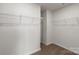 Walk-in closet with painted walls, shelves and neutral carpet at 1512 Doran Ter, Richburg, SC 29729
